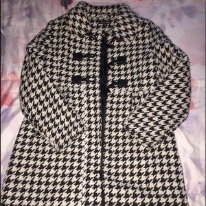 A black and white trench coat